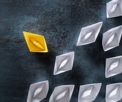 Opportunity,For,Change,In,Business,Management.,Floating,Paper,Boats,With