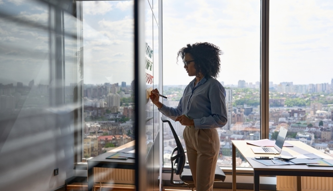 Young,African,American,Executive,Manager,Businesswoman,Writing,Strategy,Ideas,On